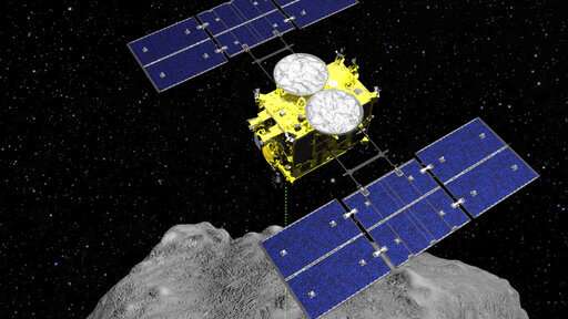 Japan spacecraft drops explosive on asteroid to make crater