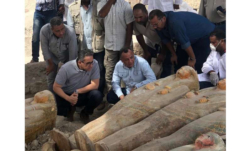 Egypt says archaeologists uncovered 20 ancient coffins