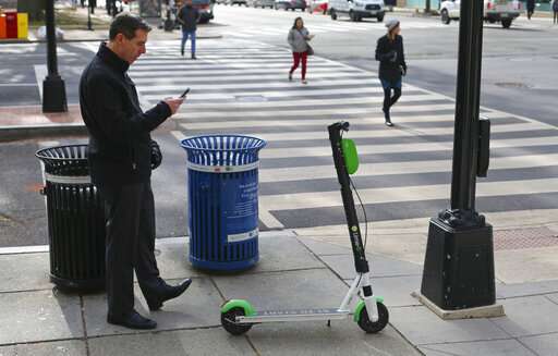 Shared electric scooters surge, overtaking docked bikes