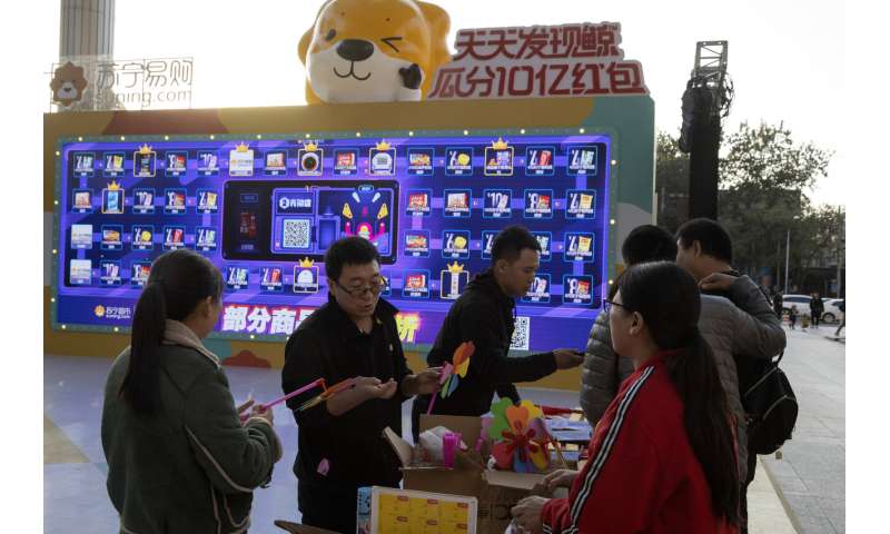 Chinese e-commerce giants report booming Singles Day sales