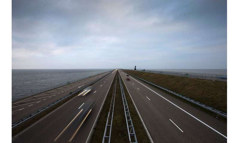 Dutch reinforce major dike as seas rise, climate changes