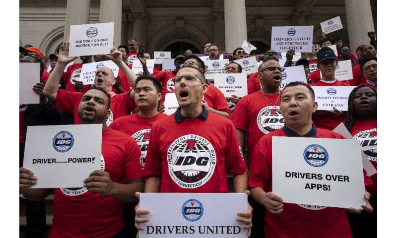 As California debated legislation on rules for rideshare drivers, activists in New York rallied on Septmebr 10 for wage enforcem