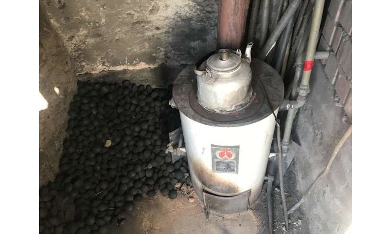 As China rapidly adopts clean energy, use of traditional stoves persists