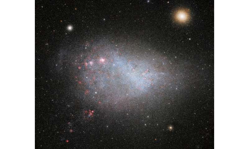 Dark energy camera takes deepest photo yet of galactic siblings