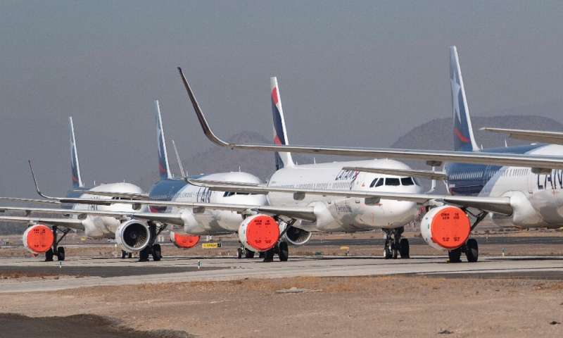 LATAM airlines aircraft sit on the tarmac at Santiago airport