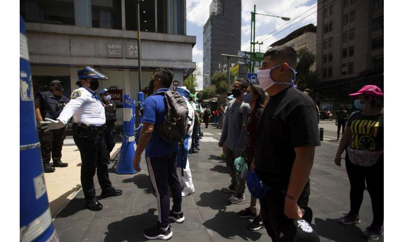 Mexico reverses some openings as virus cases continue high
