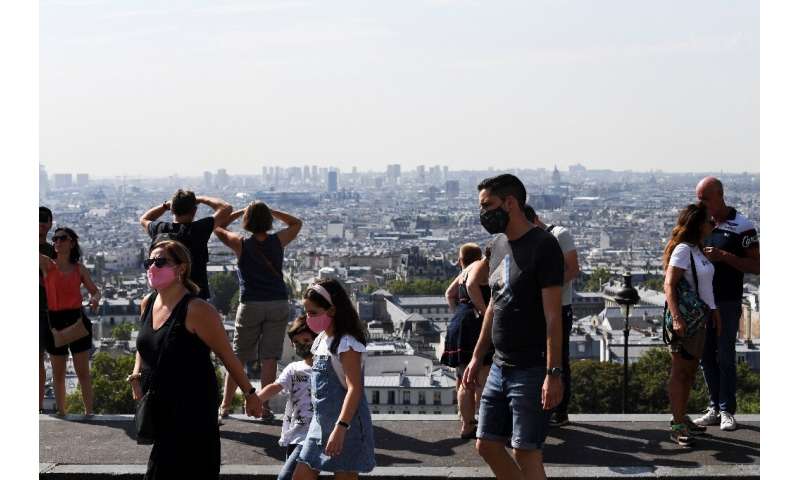 People must now wear masks at Paris spots like Montmartre, famous for its viewover the French capital's skyline