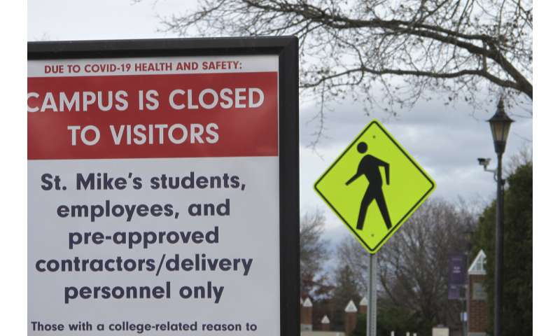 US colleges mull new virus protocols for students' return
