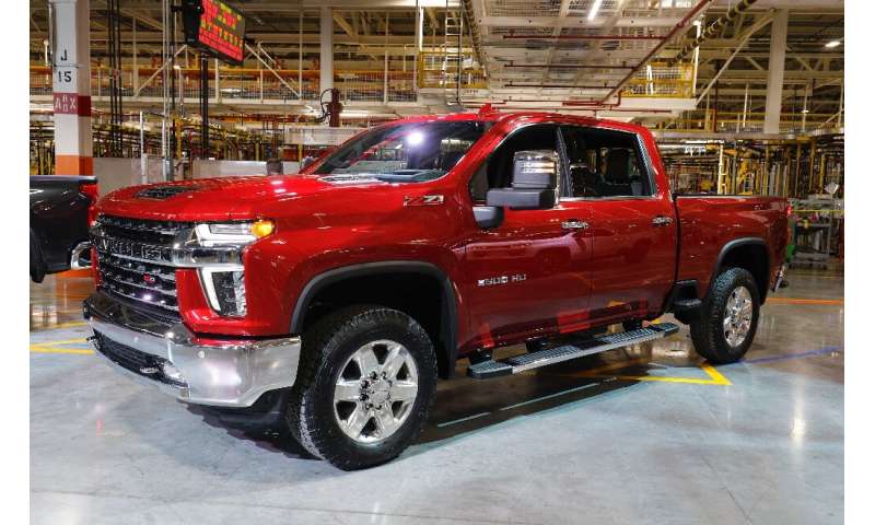 General Motors reported a jump in third-quarter profits on strong sales of the Chevy Silverado and other large vehicles