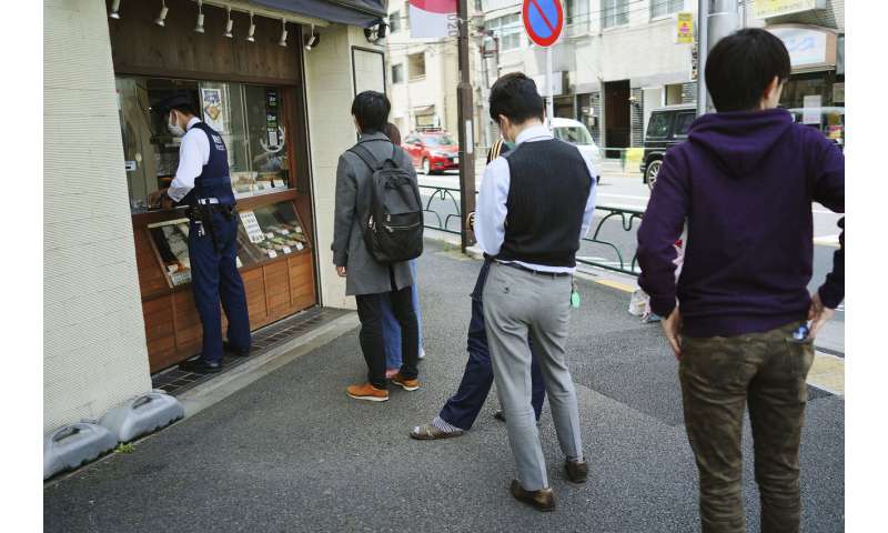 Many Japanese defy appeals to stay home to curb virus
