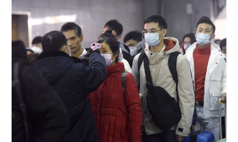 China confirms 1st death outside epicenter of viral outbreak