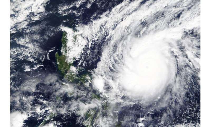 Powerful typhoon lashes Philippines, killing at least 10