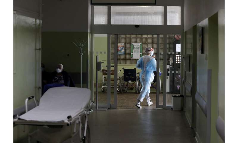 Short of medics as virus surges, central Europe sounds alarm