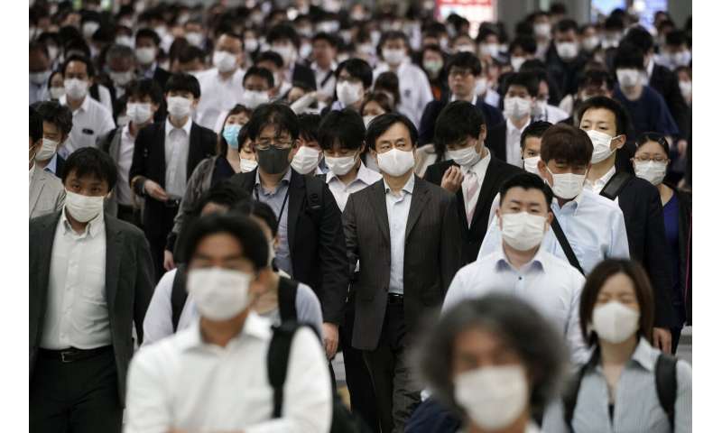 WHO warns that 1st wave of pandemic not over, dampens hopes