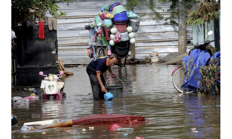 Indonesian capital reels from floods that leave 47 dead