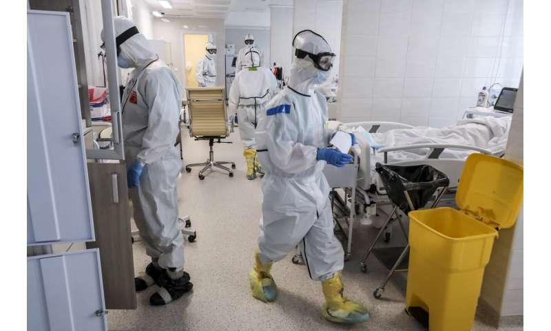 As lockdowns ease, some countries report new infection peaks