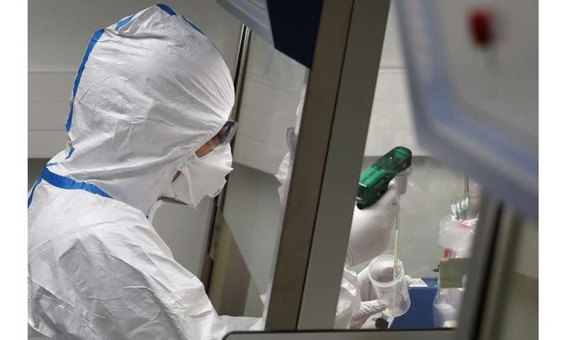 Experts scramble, but new virus vaccine may not come in time