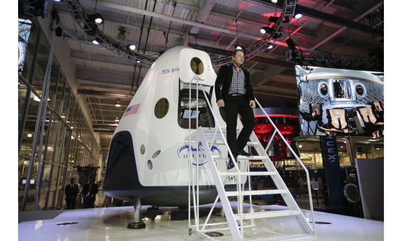 First commercial space taxi a pit stop on Musk's Mars quest