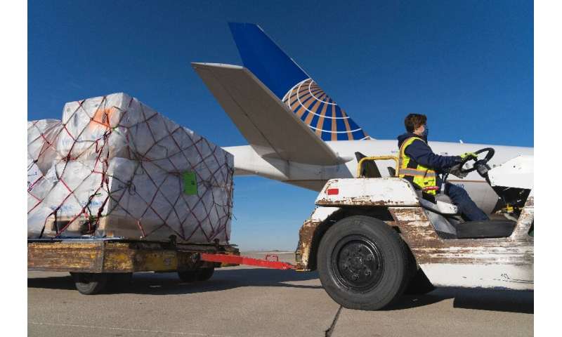 Pfizer vaccines from Belgium are unloaded at Chicago's O'Hare International Airport in early December