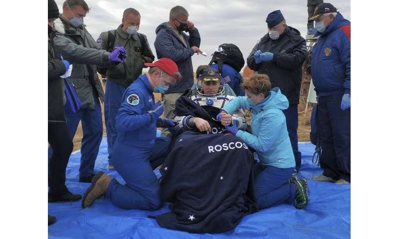 Trio who lived on space station return to Earth safely