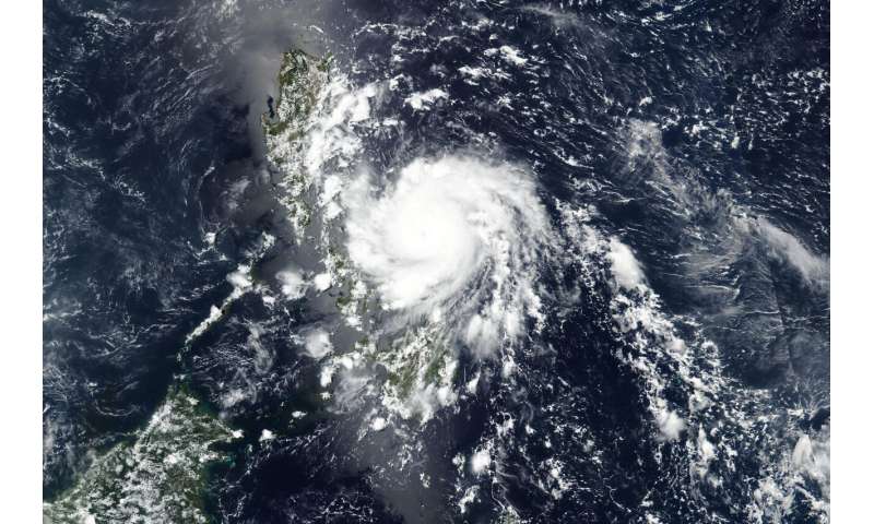Typhoon leaves 1 dead, extensive damage in Philippine towns