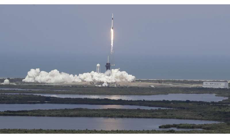'Back in the game': SpaceX ship blasts off with 2 astronauts