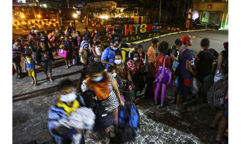 Lava gushes from volcano near Manila; tens of thousands flee