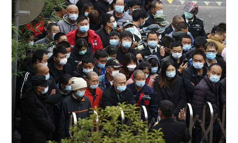 China tests millions after coronavirus flareups in 3 cities