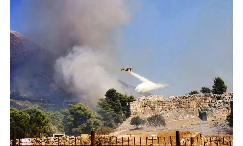Greece: Wildfire blackens gate of ancient fortress city