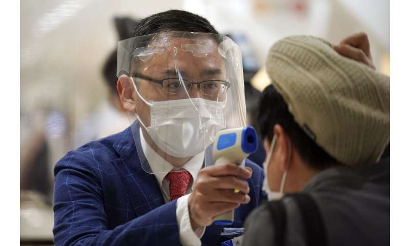 Japan lifts coronavirus emergency in all remaining areas