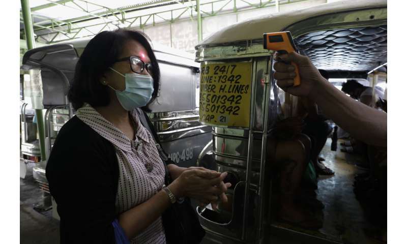 Philippines virus cases top 100,000 in 'losing battle'