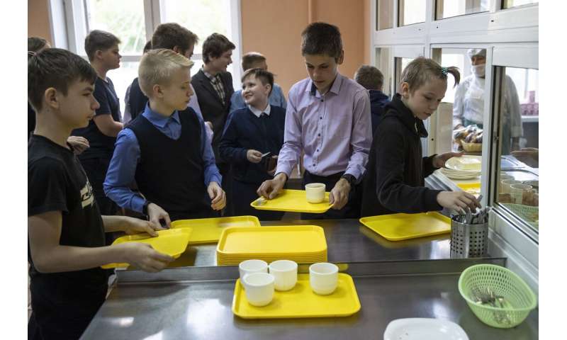 Russian schools reopen with masks, class limit precautions