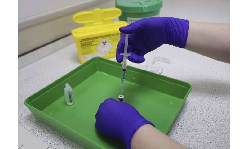 UK gears up for huge vaccination plan watched by the world