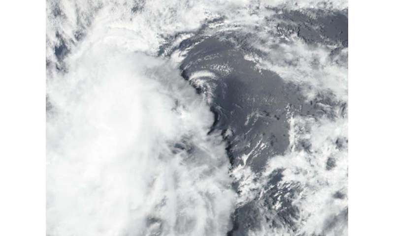 NASA finds wind shear making Tropical Depression 10E struggle