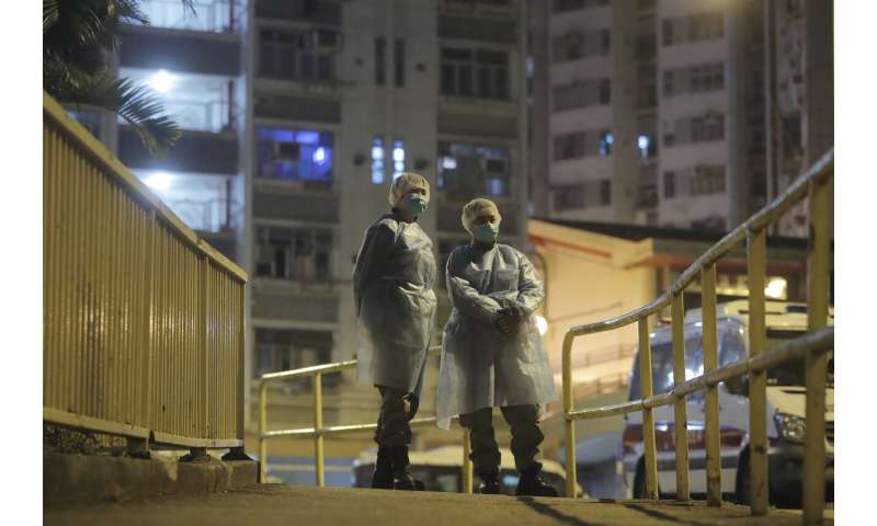 China's daily death toll from virus tops 100 for first time