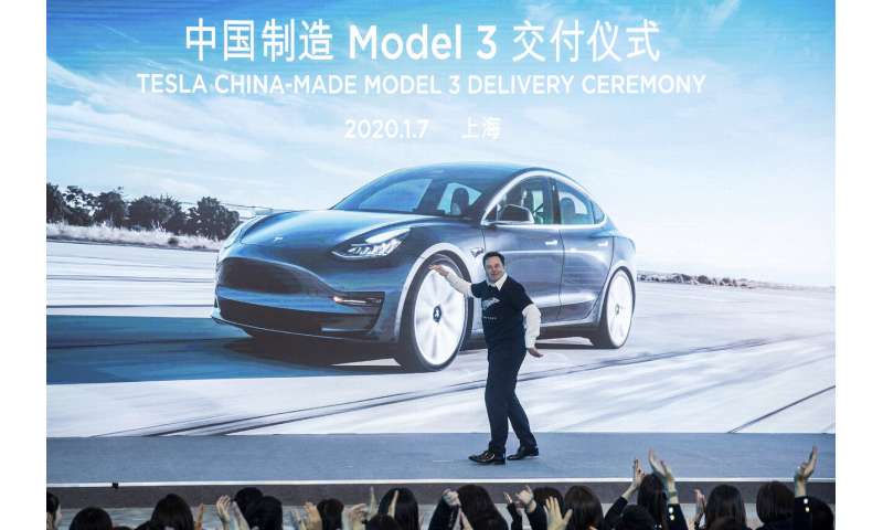 Tesla delivers first Chinese-made Model 3 to customers