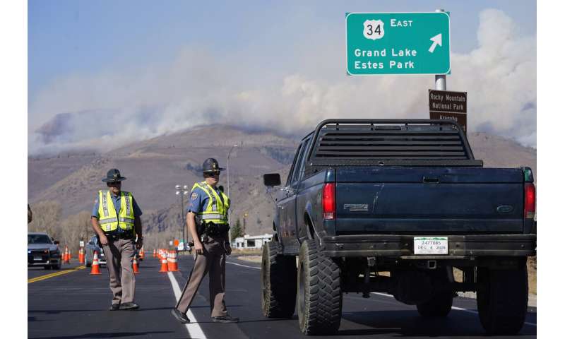 Colorado wildfires drag on later than normal, break records