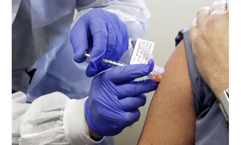 Coronavirus vaccine test opens with 1st doses