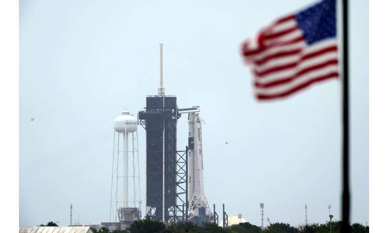 SpaceX on cusp of launching astronauts, back on home turf