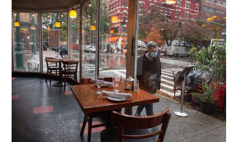 New York closes bars to curb virus resurgence as deaths top 1.3 mn thumbnail