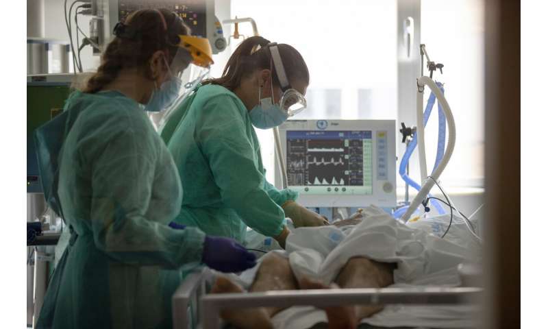Battered by 1st wave, Madrid hospital staff blench at 2nd