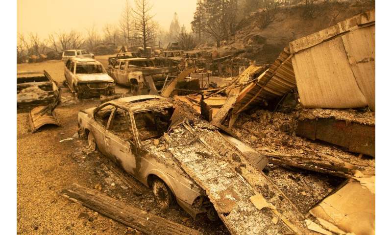 Burned vehicles smoldering in Fresno County, California