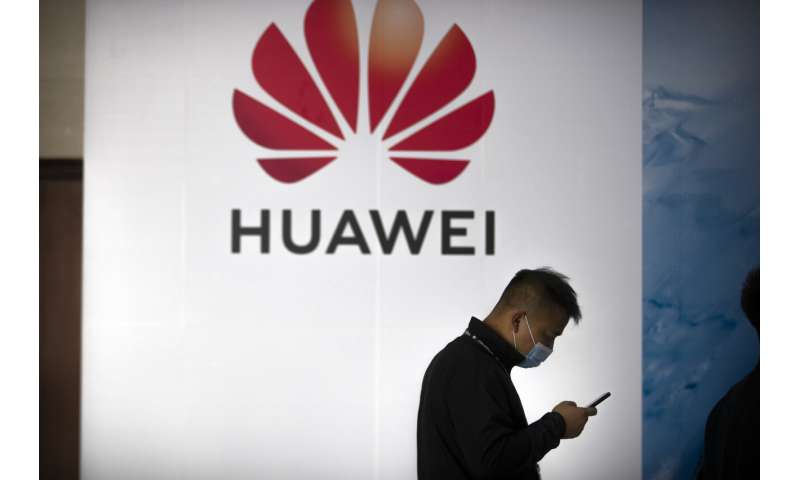Huawei sales up, but growth slows under virus, US pressure