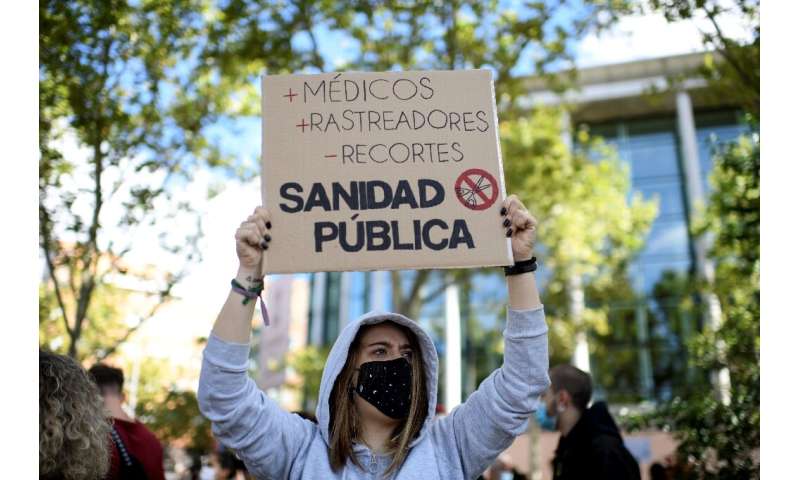 Madrid demonstrators complain the regional government isn't doing what's needed on public health