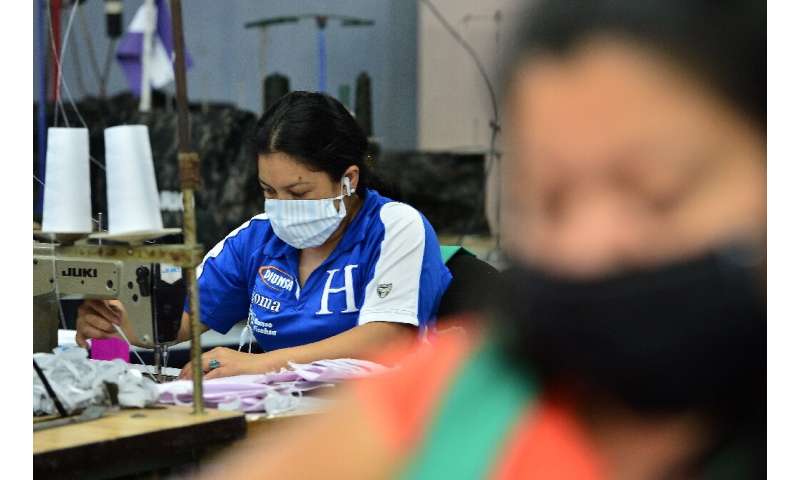 Military personnel in Honduras make face masks in the capital Tegucigalpa for members of the health sector who are in the frontl