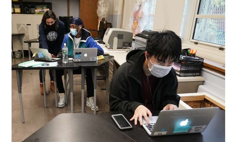 New York City schools to close again as virus rate rises