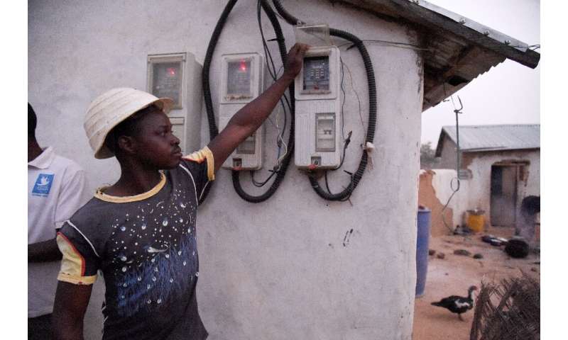 Pre-paid meters are installed on homes in Takpapieni—householders buy credit to access electricity from the mini-grid