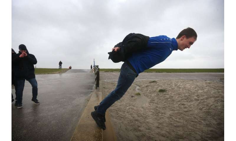 Storm Ciara has brought hurricane-force winds and torrential rain, causing transport disruption across northern Europe