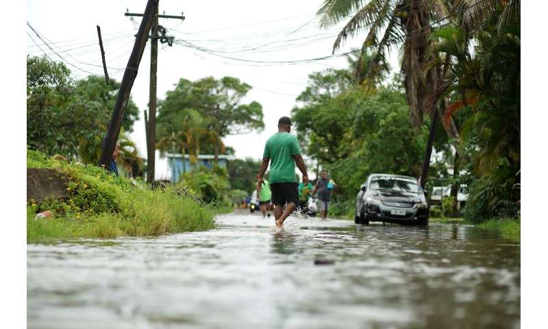 Super Cyclone Yasa was already causing widespread flooding, cutting off roads and leaving communities isolated