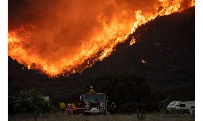 The so-called Apple Fire has charred more than 20,000 acres (8,000 hectares) near San Bernardino, California
